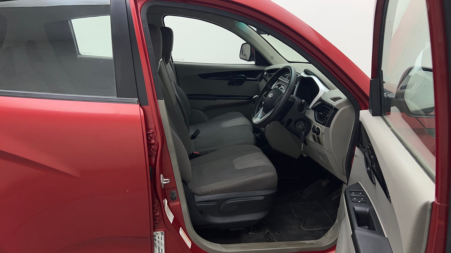 Used 2016 Mahindra KUV100 K6+ 6 STR Petrol Manual interior RIGHT SIDE FRONT DOOR CABIN VIEW