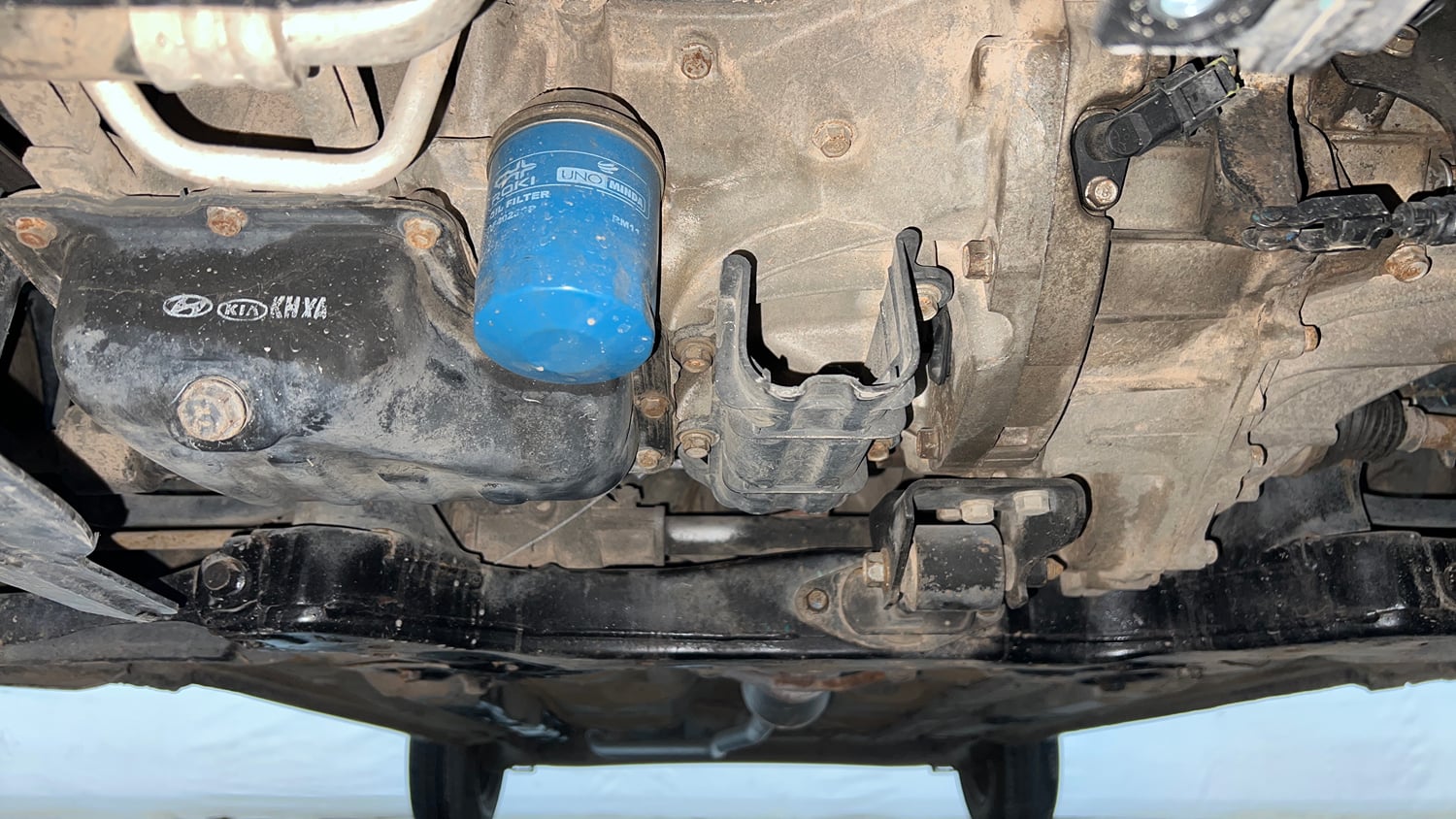 Used 2015 Hyundai Grand i10 Sportz 1.2 Kappa VTVT Petrol Manual extra FRONT LEFT UNDERBODY VIEW
