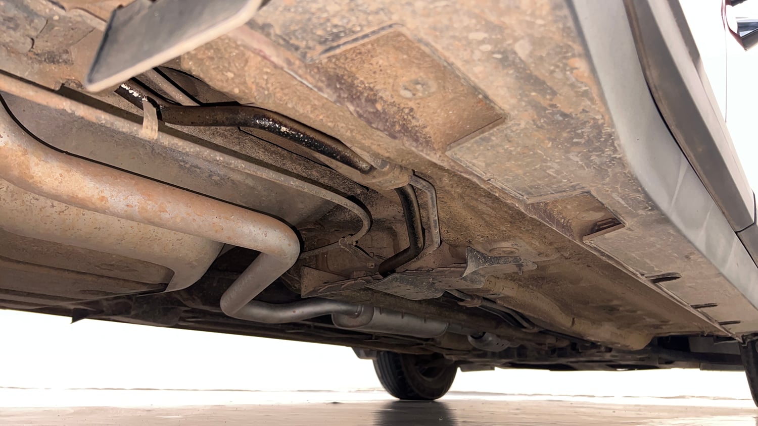 Used 2025 Kia Carens Premium (O) 1.5 Petrol 7 STR Petrol Manual extra REAR RIGHT UNDERBODY VIEW