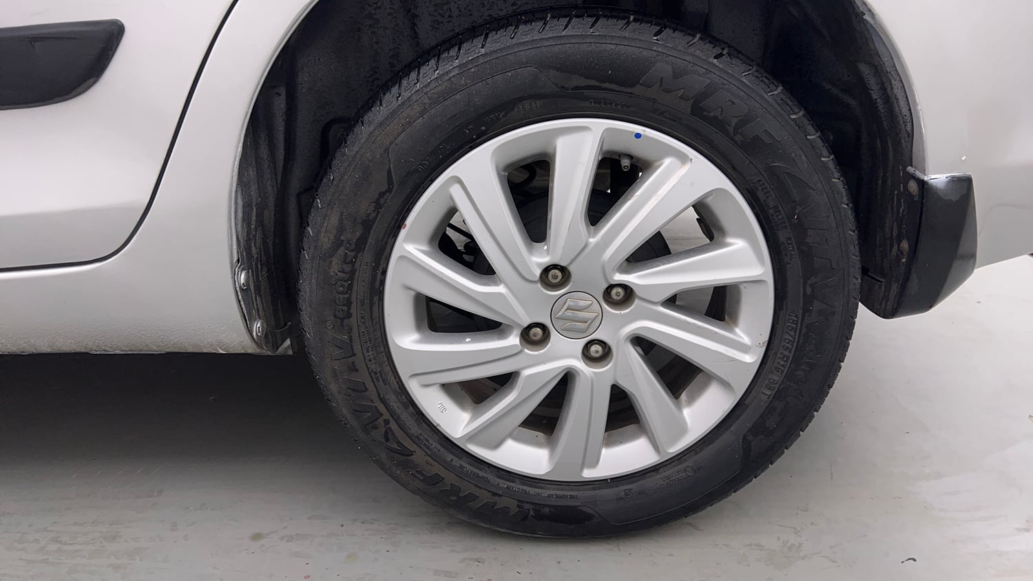 Used 2015 Maruti Suzuki Swift Dzire ZXI Petrol Manual tyres LEFT REAR TYRE RIM VIEW