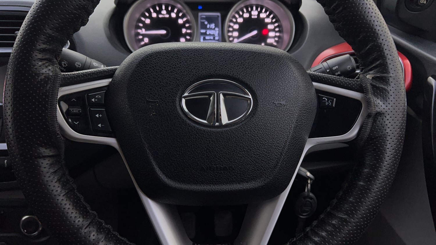 Used 2016 Tata Tiago Revotron XZ w/o Alloy Petrol Manual top_features Airbags