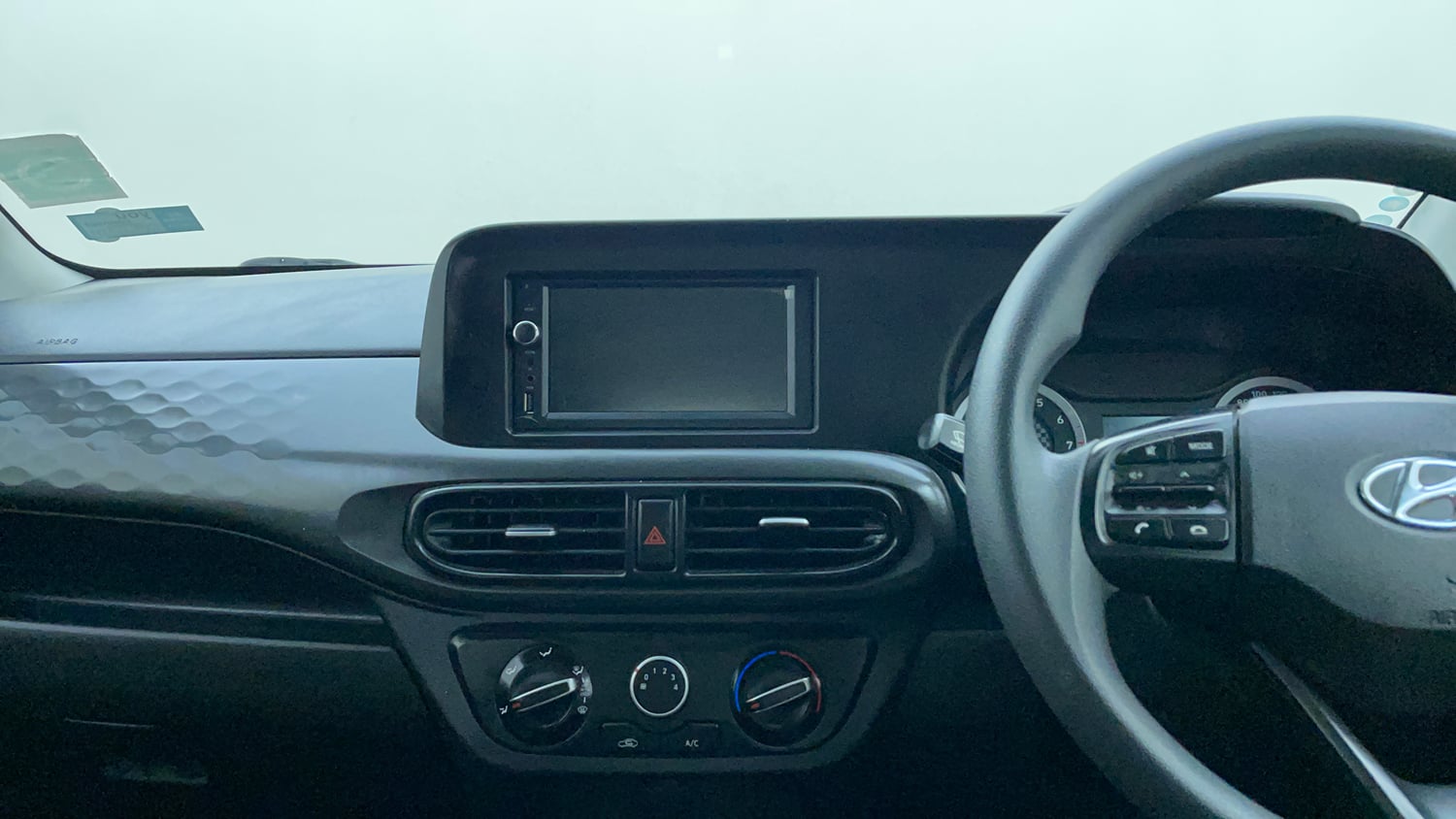 Used 2022 Hyundai Grand i10 Nios Corporate Edition MT Petrol Manual interior MUSIC SYSTEM & AC CONTROL VIEW