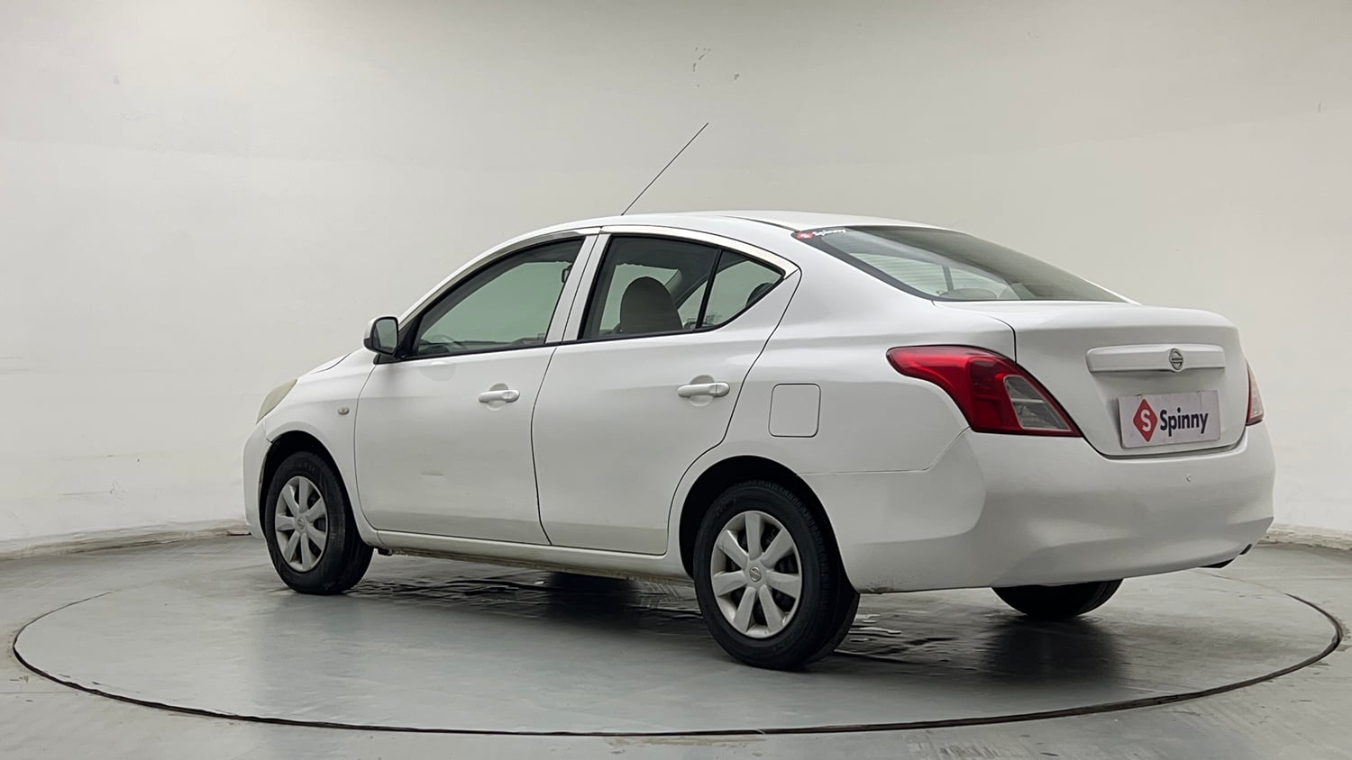 Used 2013 Nissan Sunny XL Petrol Manual exterior LEFT REAR CORNER VIEW