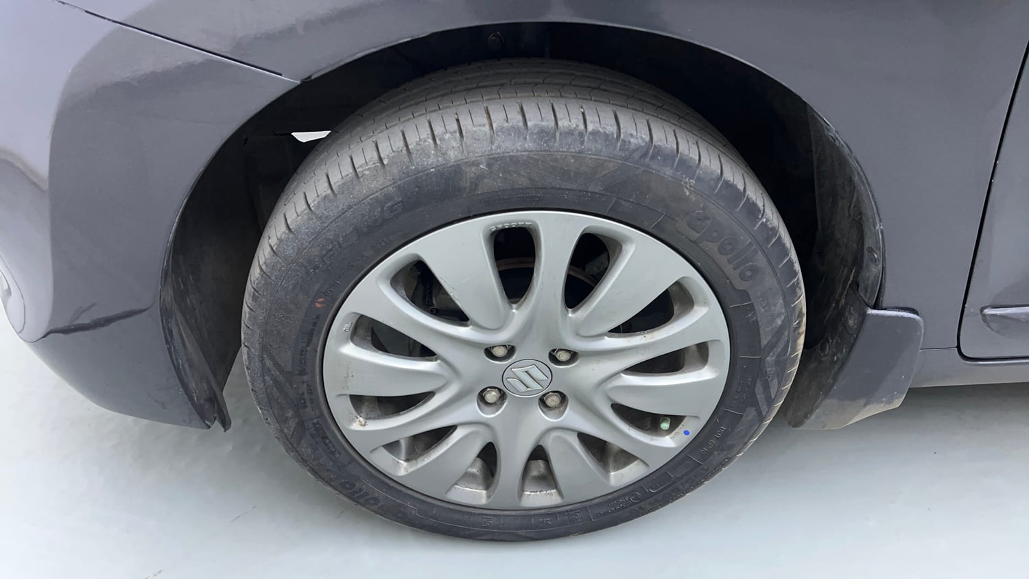 Used 2016 Maruti Suzuki Baleno Alpha 1.2 Petrol Manual tyres LEFT FRONT TYRE RIM VIEW