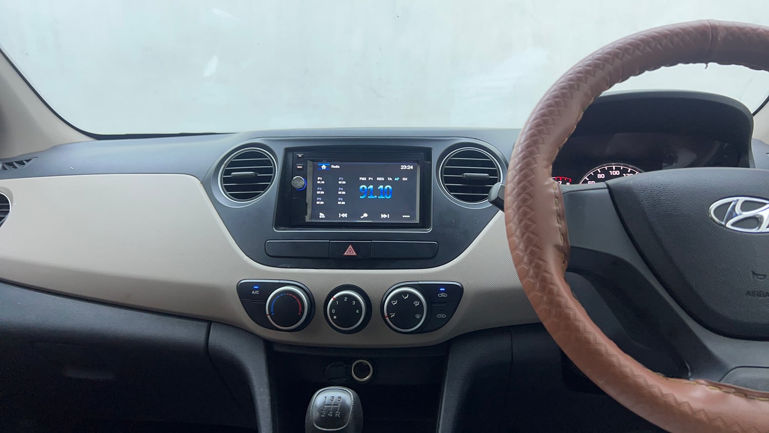 Used 2018 Hyundai Grand i10 Magna 1.2 Kappa VTVT Petrol Manual interior MUSIC SYSTEM & AC CONTROL VIEW