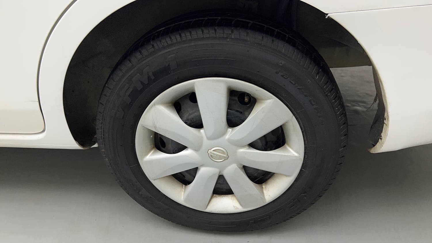 Used 2013 Nissan Sunny XL Petrol Manual tyres LEFT REAR TYRE RIM VIEW