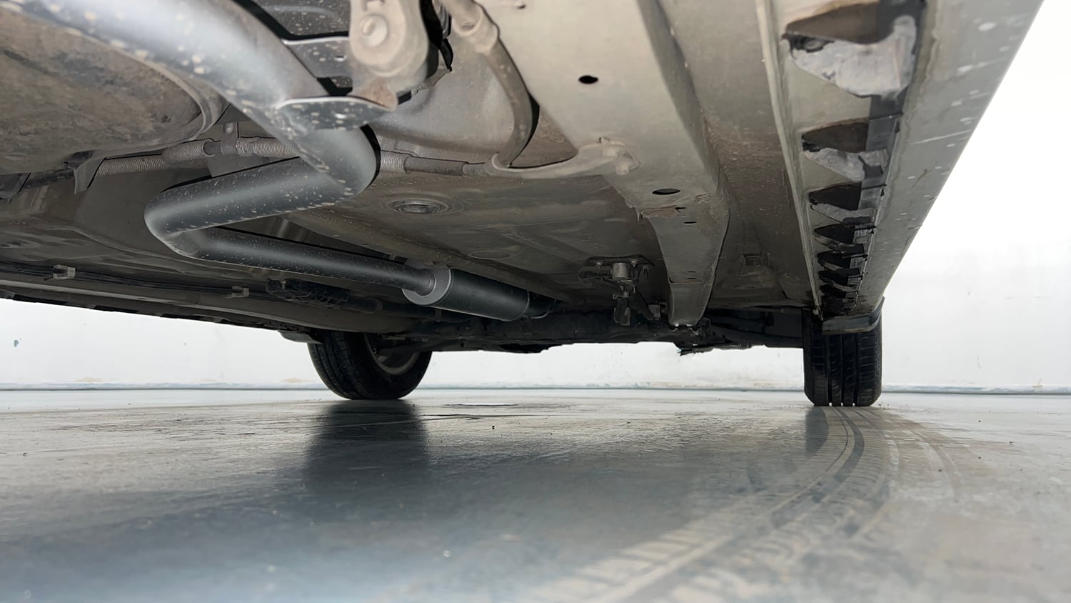 Used 2021 Maruti Suzuki XL6 Zeta AT Petrol Petrol Automatic extra REAR RIGHT UNDERBODY VIEW
