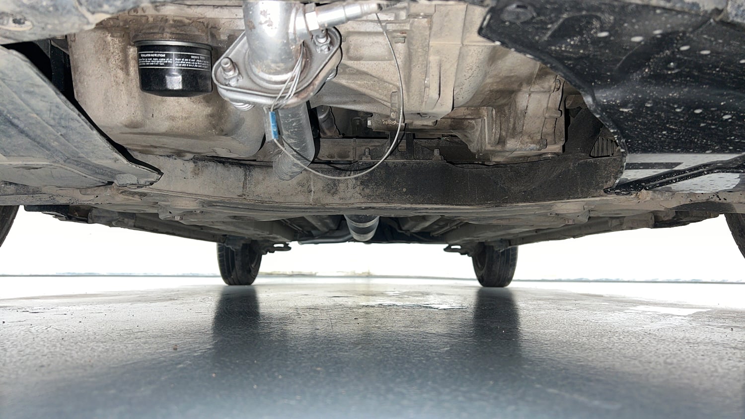 Used 2015 Maruti Suzuki Swift Dzire VXI Petrol Manual extra FRONT LEFT UNDERBODY VIEW