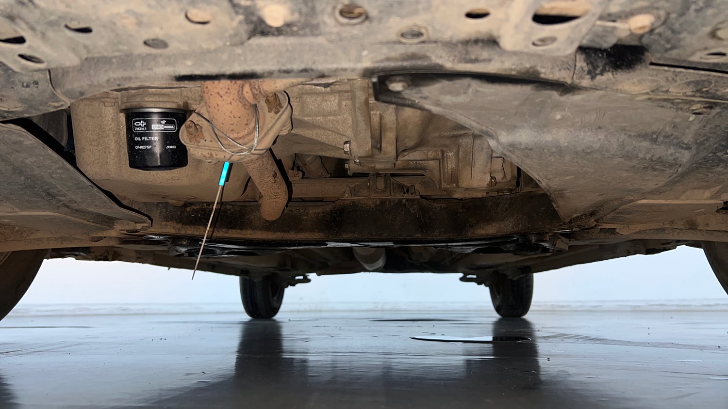 Used 2015 Maruti Suzuki Swift VXi Petrol Manual extra FRONT LEFT UNDERBODY VIEW