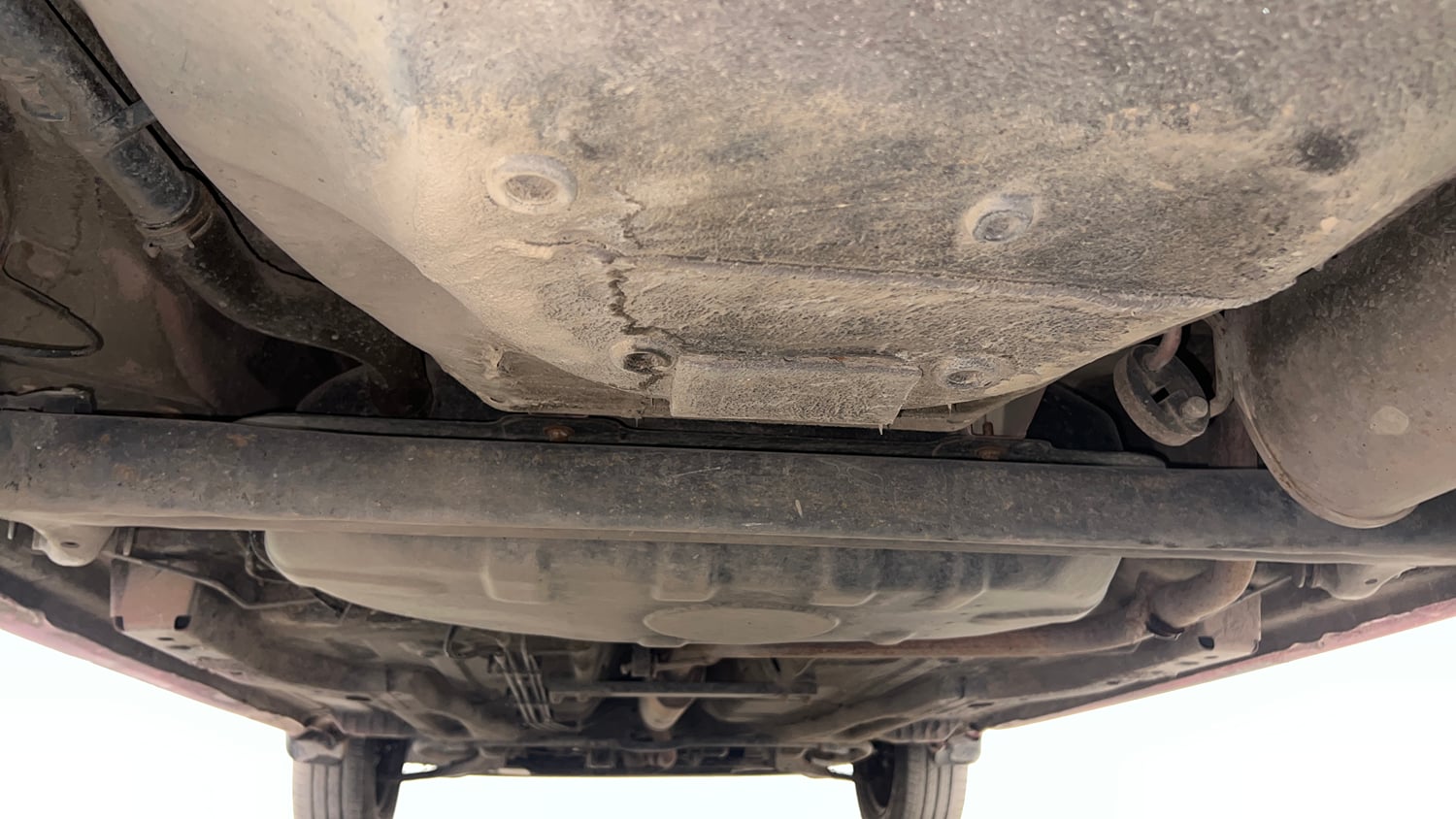 Used 2016 Tata Tiago Revotron XZ w/o Alloy Petrol Manual extra REAR UNDERBODY VIEW (TAKEN FROM REAR)