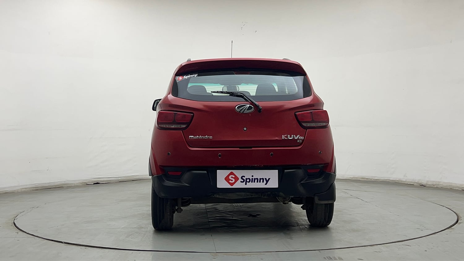 Used 2016 Mahindra KUV100 K6+ 6 STR Petrol Manual exterior BACK VIEW