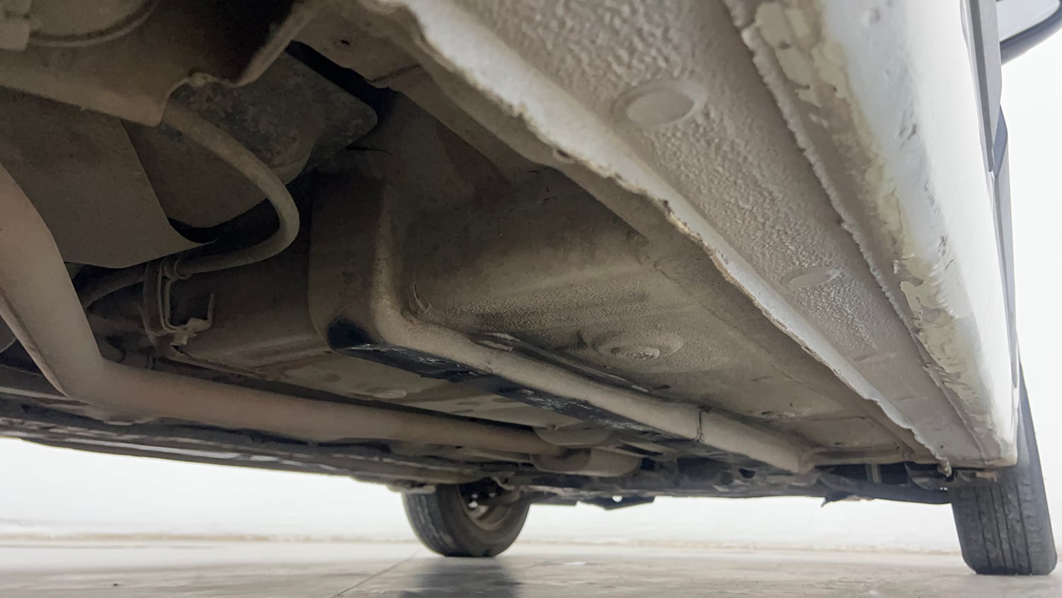 Used 2015 Hyundai Xcent S 1.2 (O) Petrol Manual extra REAR RIGHT UNDERBODY VIEW