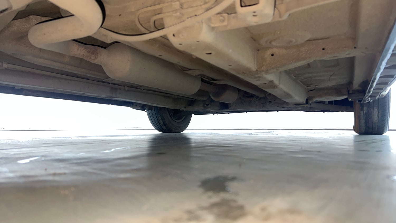 Used 2016 Maruti Suzuki Swift Dzire VXI AT Petrol Automatic extra REAR RIGHT UNDERBODY VIEW