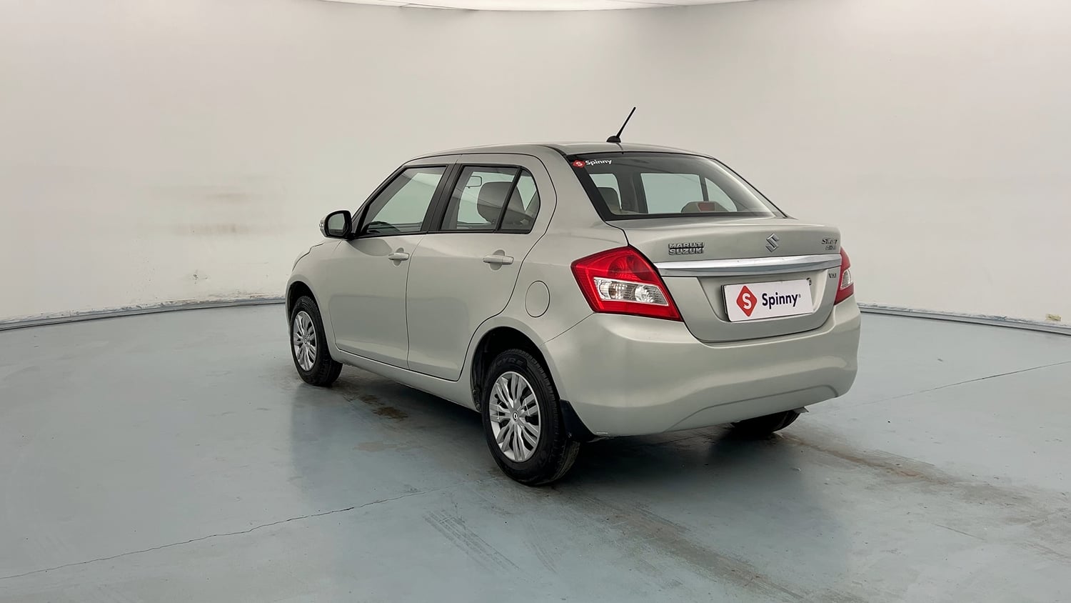 Used 2015 Maruti Suzuki Swift Dzire VXI Petrol Manual exterior LEFT REAR CORNER VIEW