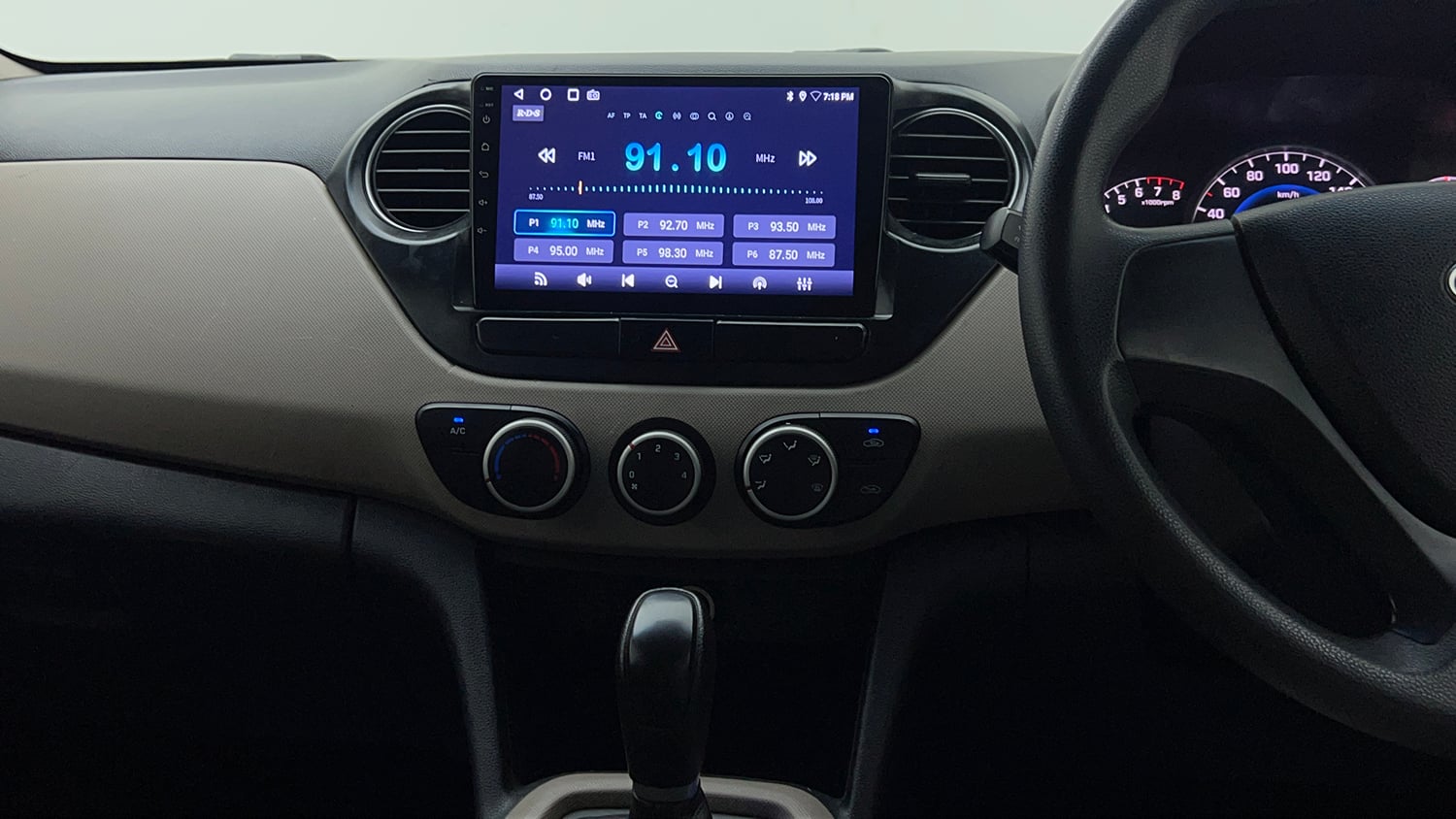Used 2016 Hyundai Grand i10 Magna AT 1.2 Kappa VTVT Petrol Automatic interior MUSIC SYSTEM & AC CONTROL VIEW