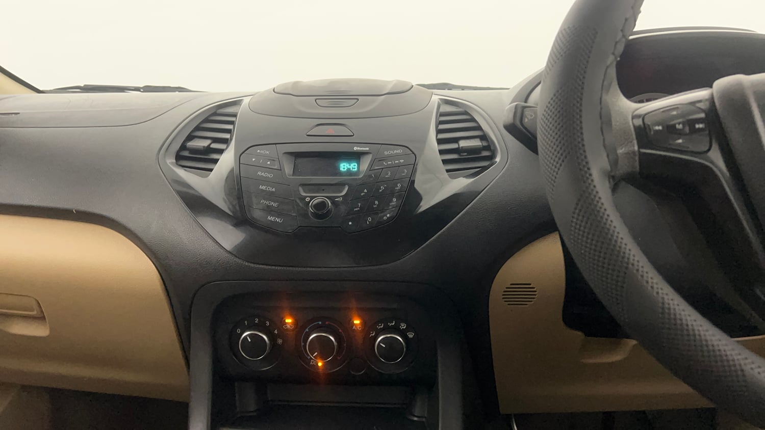 Used 2016 Ford Figo Aspire Trend 1.2 Ti-VCT Petrol Manual interior MUSIC SYSTEM & AC CONTROL VIEW