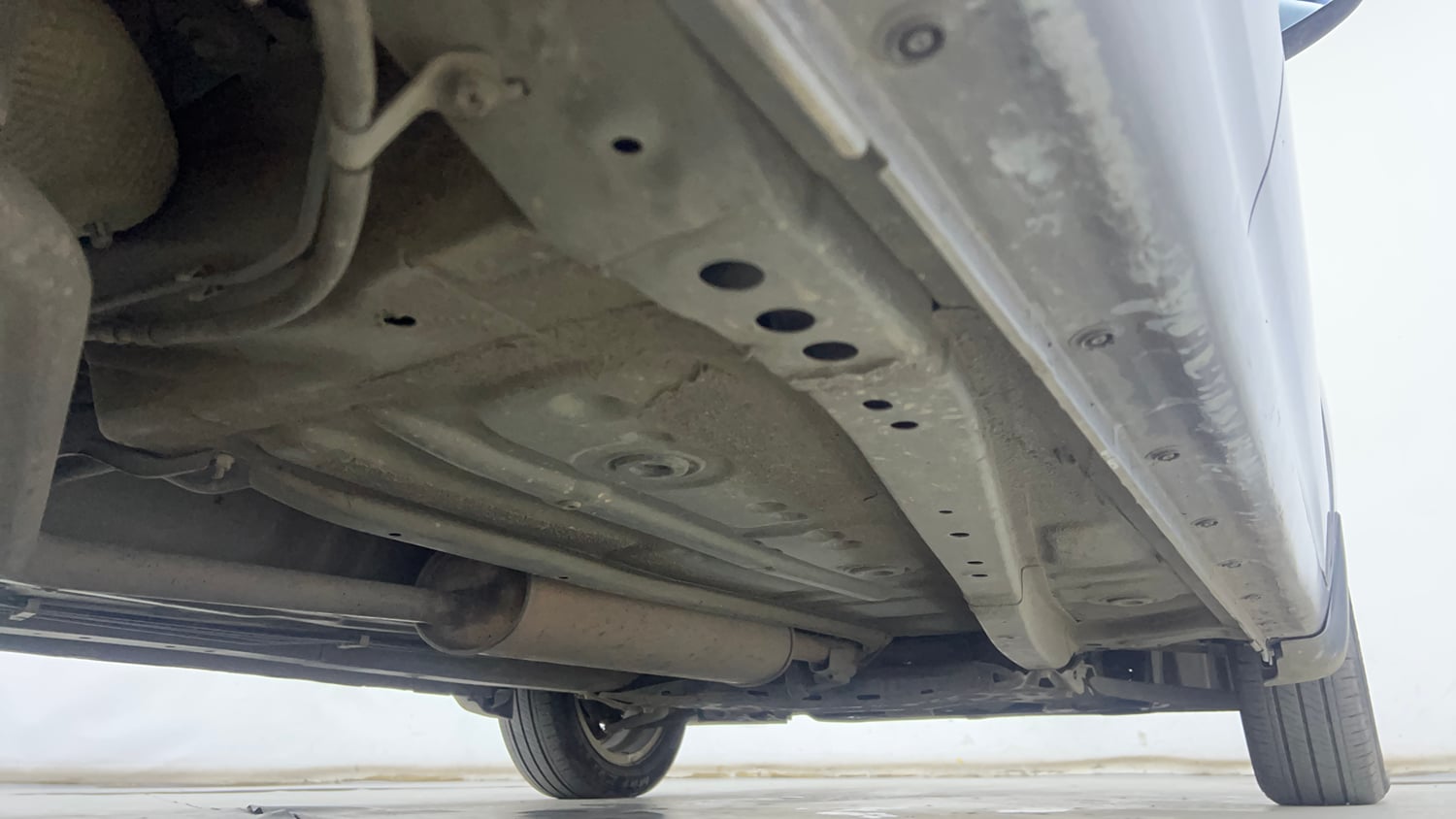 Used 2022 Maruti Suzuki Celerio ZXi Plus AMT Petrol Automatic extra REAR RIGHT UNDERBODY VIEW