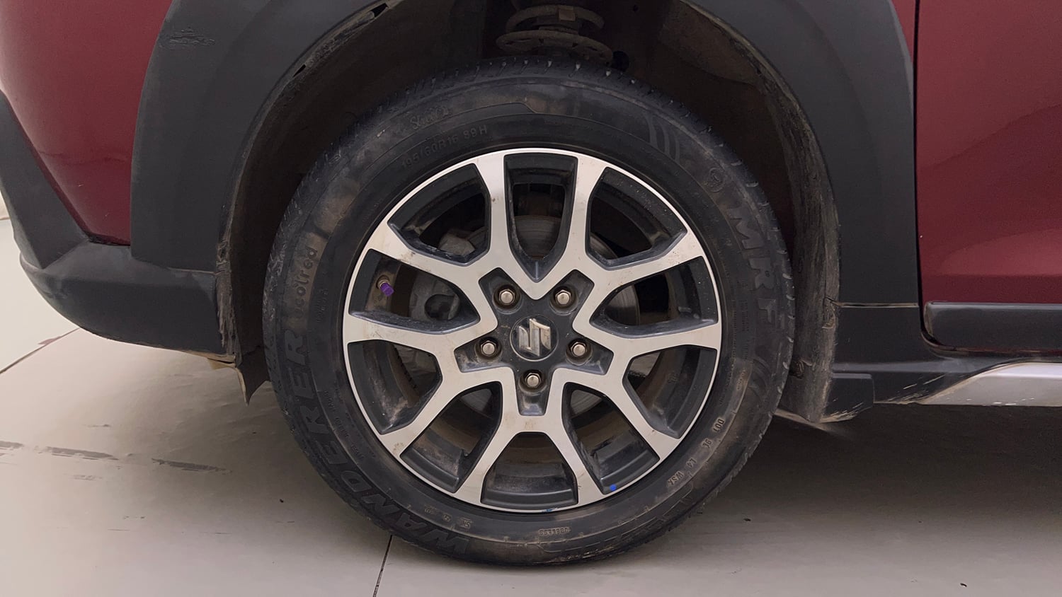 Used 2023 Maruti Suzuki XL6 Alpha Plus AT Petrol Dual Tone Petrol Automatic tyres LEFT FRONT TYRE RIM VIEW