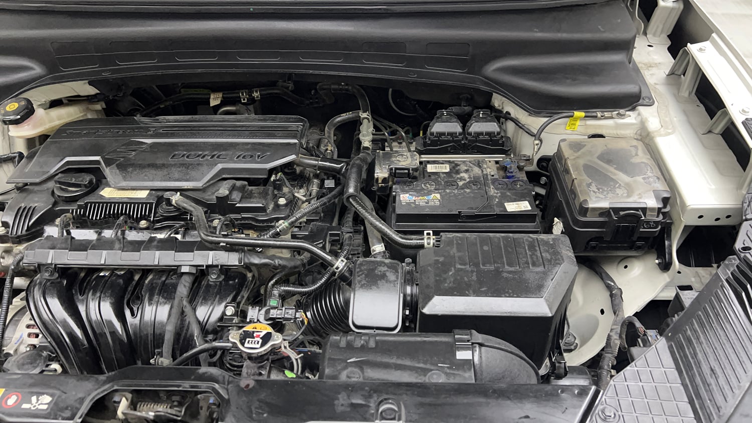 Used 2022 Hyundai Alcazar Signature (O) 6 STR 2.0 Petrol AT Dual Tone Petrol Automatic engine ENGINE LEFT SIDE VIEW