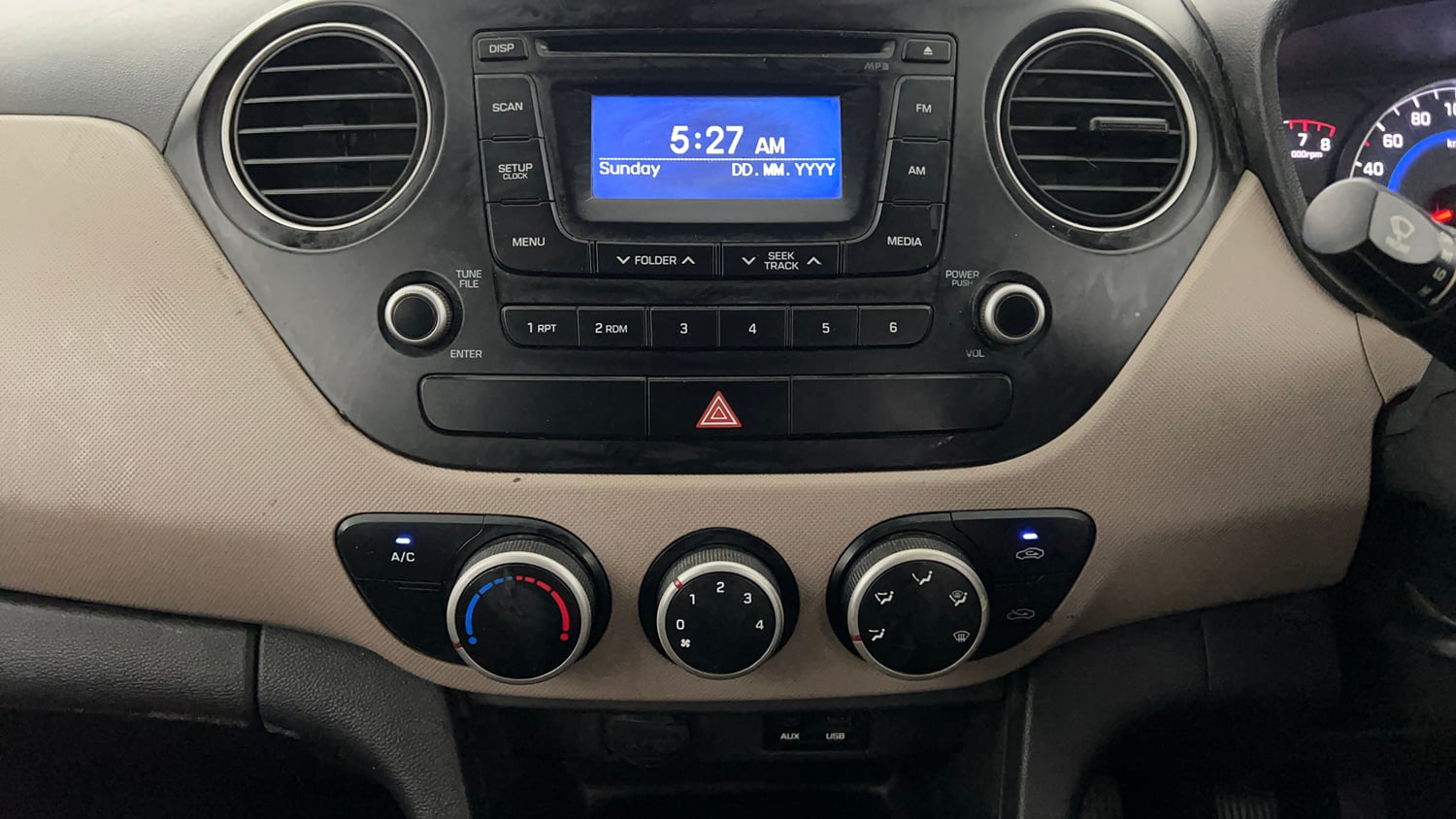Used 2015 Hyundai Grand i10 Sportz 1.2 Kappa VTVT Petrol Manual interior MUSIC SYSTEM & AC CONTROL VIEW