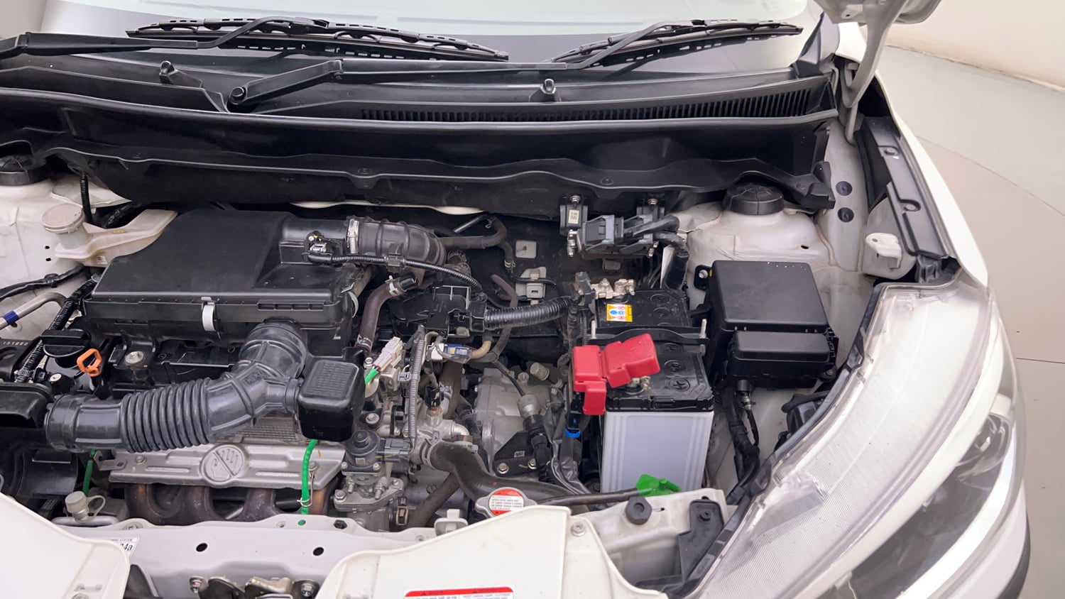 Used 2023 Maruti Suzuki Ertiga ZXi AT Petrol Automatic engine ENGINE LEFT SIDE HINGE & APRON VIEW