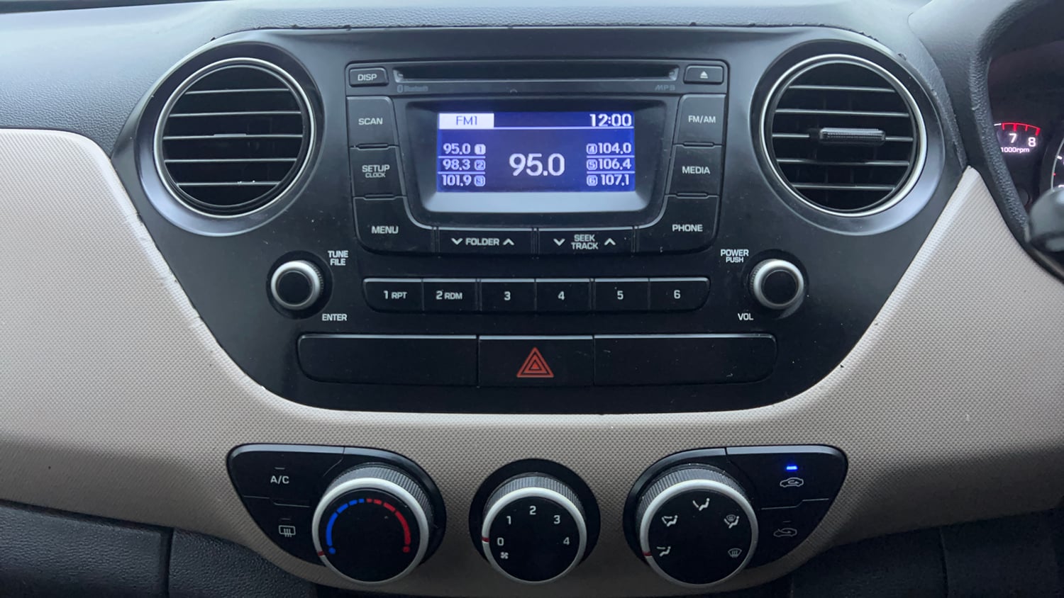 Used 2016 Hyundai Grand i10 Sportz 1.2 Kappa VTVT Petrol Manual interior MUSIC SYSTEM & AC CONTROL VIEW