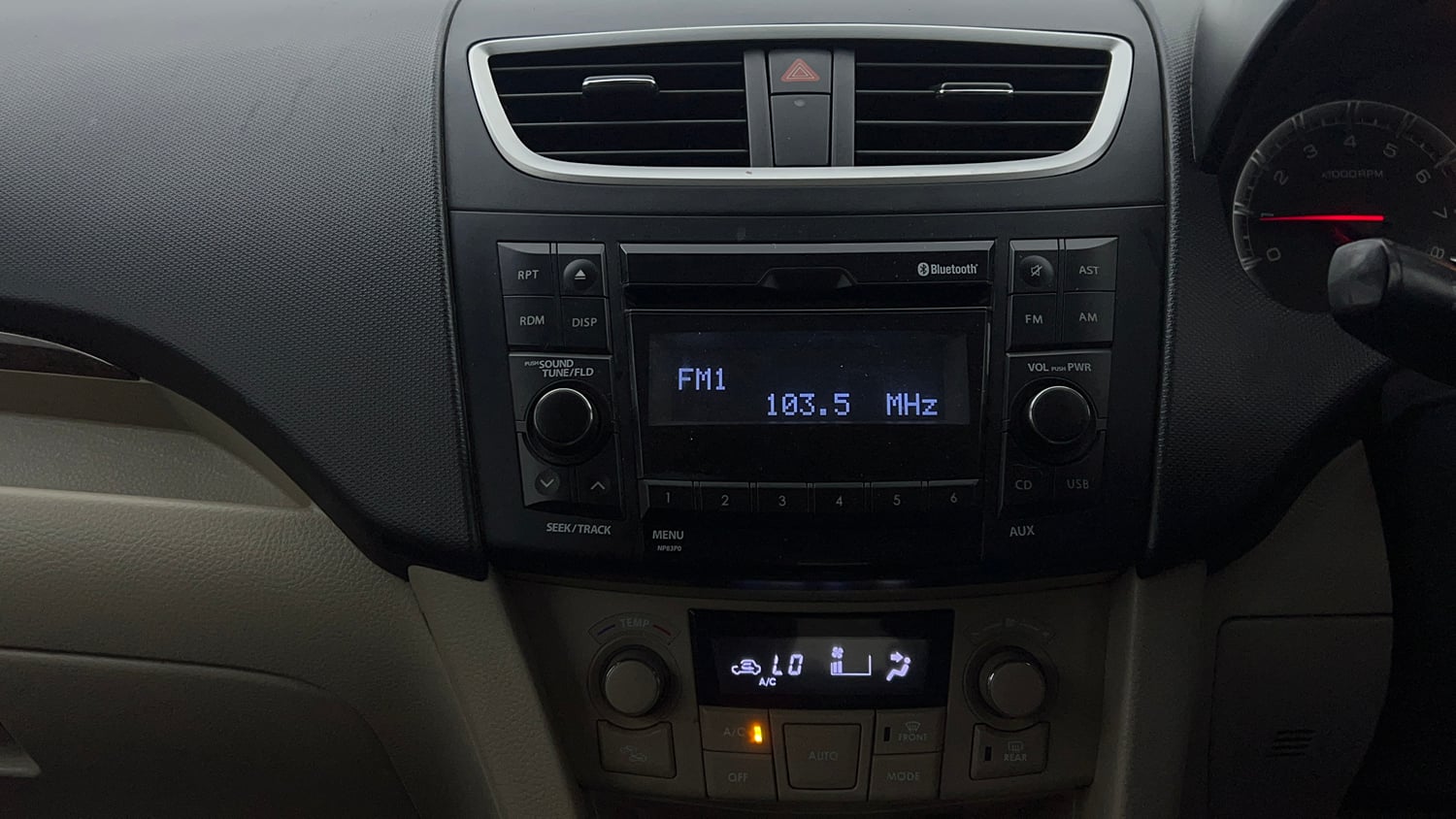 Used 2015 Maruti Suzuki Swift Dzire ZXI Petrol Manual top_features Integrated (in-dash) music system