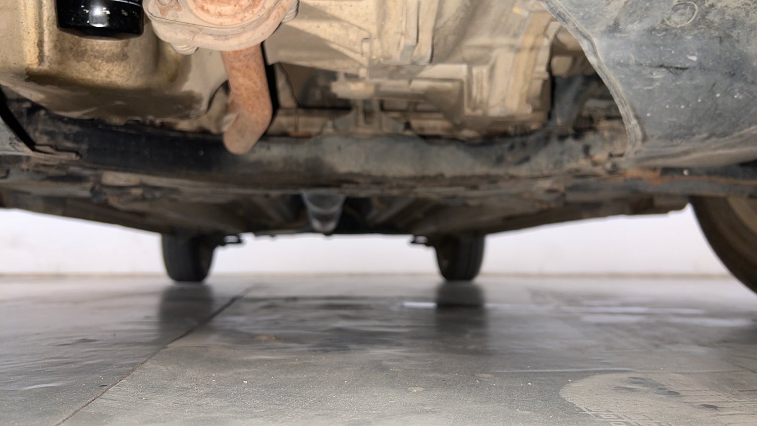 Used 2015 Maruti Suzuki Swift Dzire ZXI Petrol Manual extra FRONT LEFT UNDERBODY VIEW