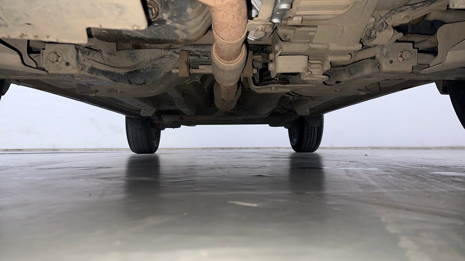 Used 2022 Tata Nexon XZA Plus  (S) Dual Tone Petrol Automatic extra FRONT LEFT UNDERBODY VIEW