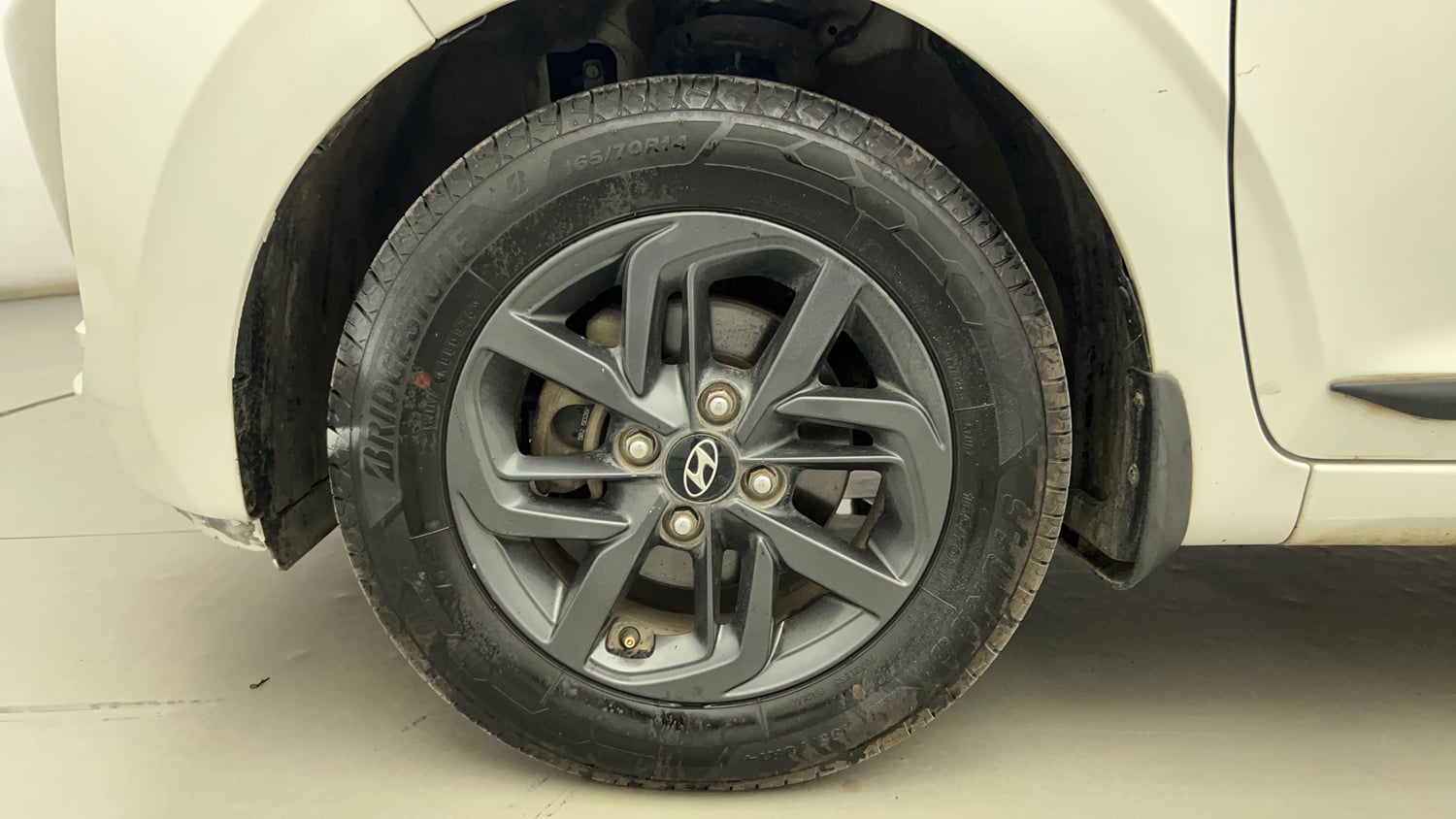 Used 2021 Hyundai Grand i10 Nios Sportz AMT 1.2 Kappa VTVT Petrol Automatic tyres LEFT FRONT TYRE RIM VIEW