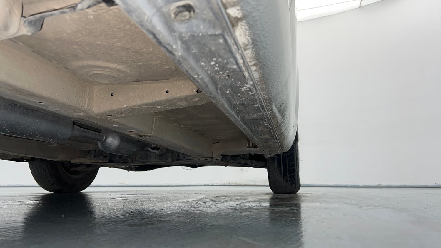 Used 2015 Maruti Suzuki Swift Dzire VXI Petrol Manual extra REAR RIGHT UNDERBODY VIEW