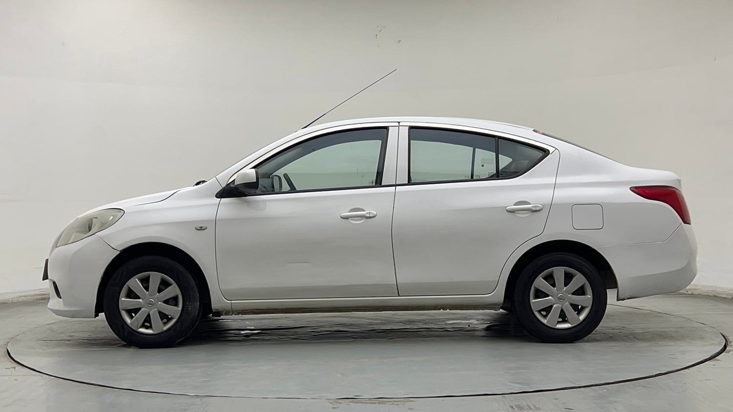 Used 2013 Nissan Sunny XL Petrol Manual exterior LEFT SIDE VIEW