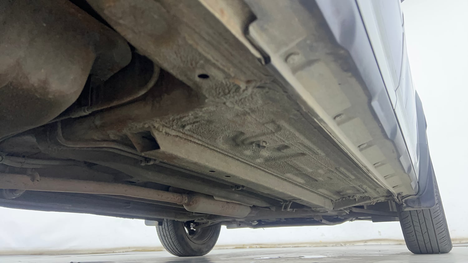 Used 2021 Renault Kiger RXZ AMT Dual Tone Petrol Automatic extra REAR RIGHT UNDERBODY VIEW