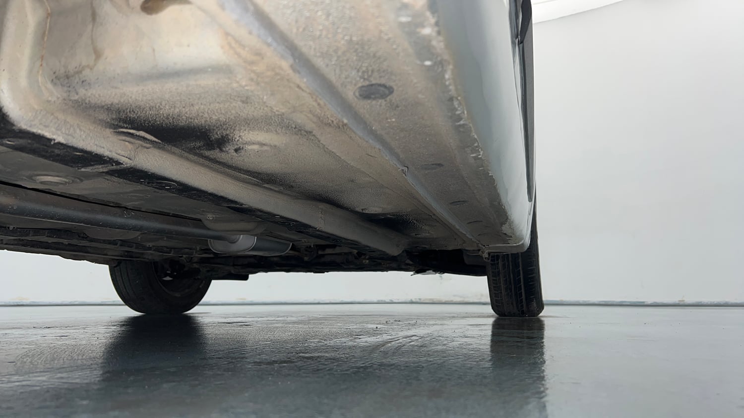Used 2015 Hyundai Grand i10 Sportz 1.2 Kappa VTVT Petrol Manual extra REAR RIGHT UNDERBODY VIEW