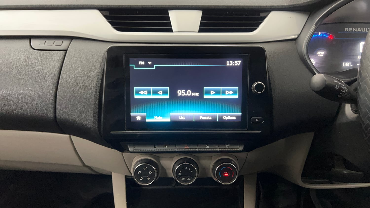 Used 2023 Renault Triber RXZ Petrol Manual interior MUSIC SYSTEM & AC CONTROL VIEW