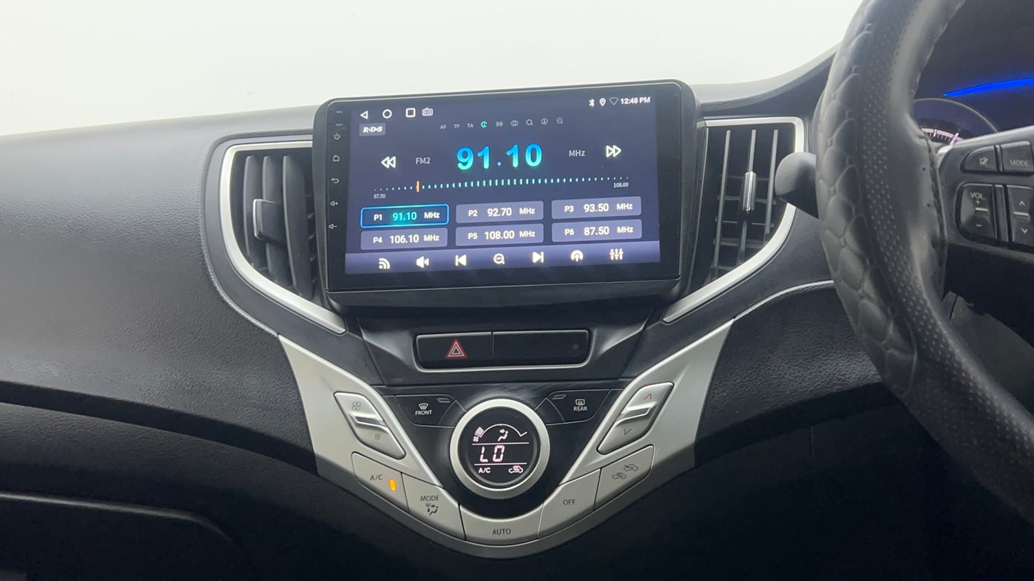 Used 2018 Maruti Suzuki Baleno Delta 1.2 Petrol Manual interior MUSIC SYSTEM & AC CONTROL VIEW