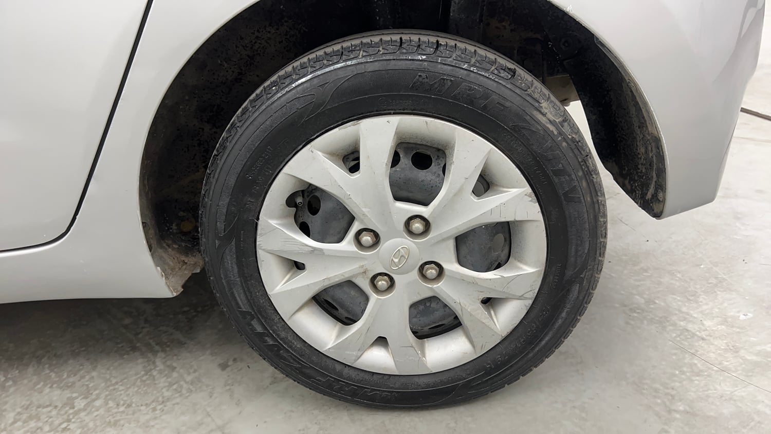 Used 2015 Hyundai Grand i10 Magna 1.2 Kappa VTVT Petrol Manual tyres LEFT REAR TYRE RIM VIEW