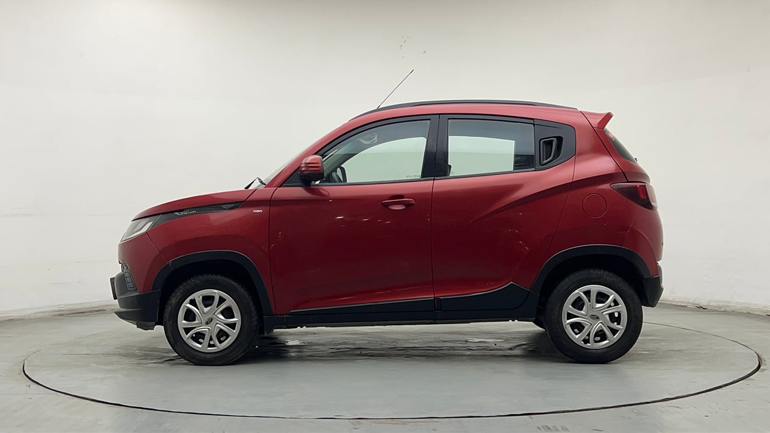 Used 2016 Mahindra KUV100 K6+ 6 STR Petrol Manual exterior LEFT SIDE VIEW
