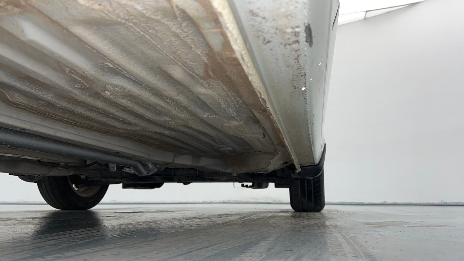 Used 2021 Honda Amaze 1.2 V MT Petrol Petrol Manual extra REAR RIGHT UNDERBODY VIEW