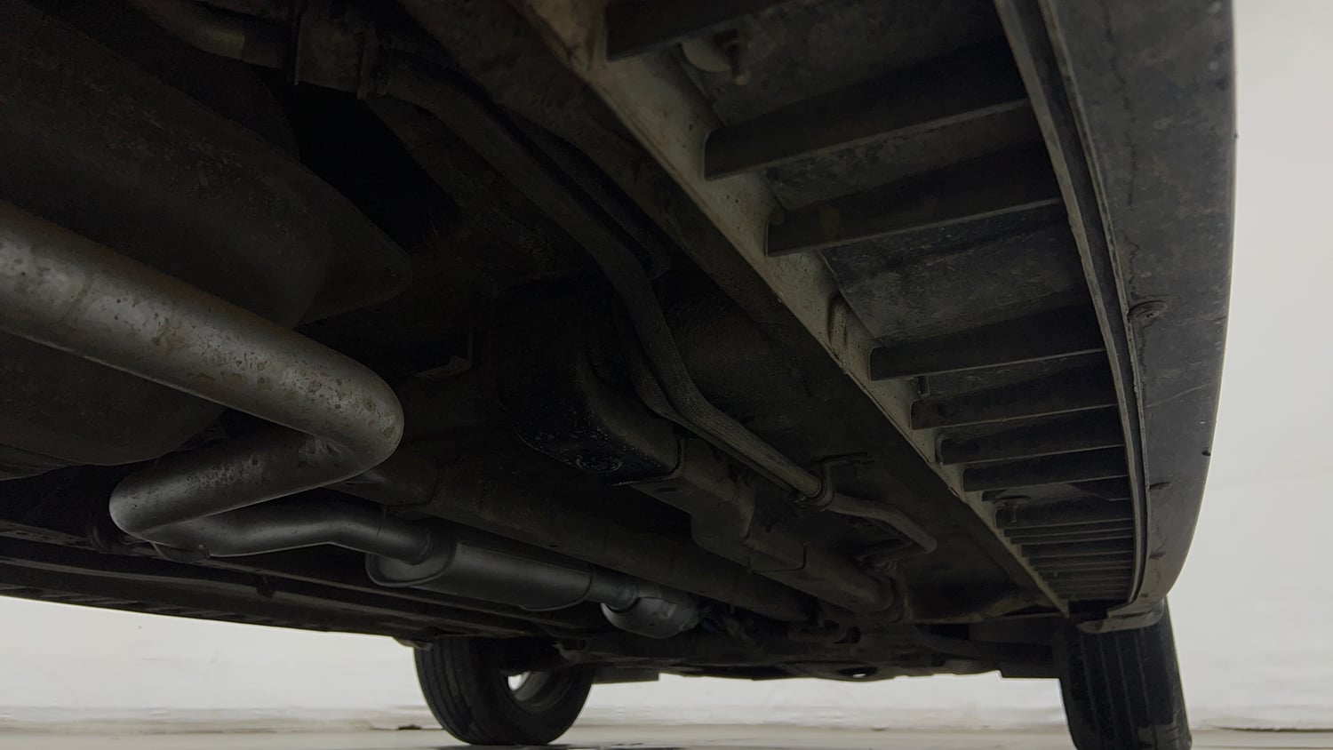 Used 2022 Hyundai Alcazar Signature (O) 6 STR 2.0 Petrol AT Dual Tone Petrol Automatic extra REAR RIGHT UNDERBODY VIEW