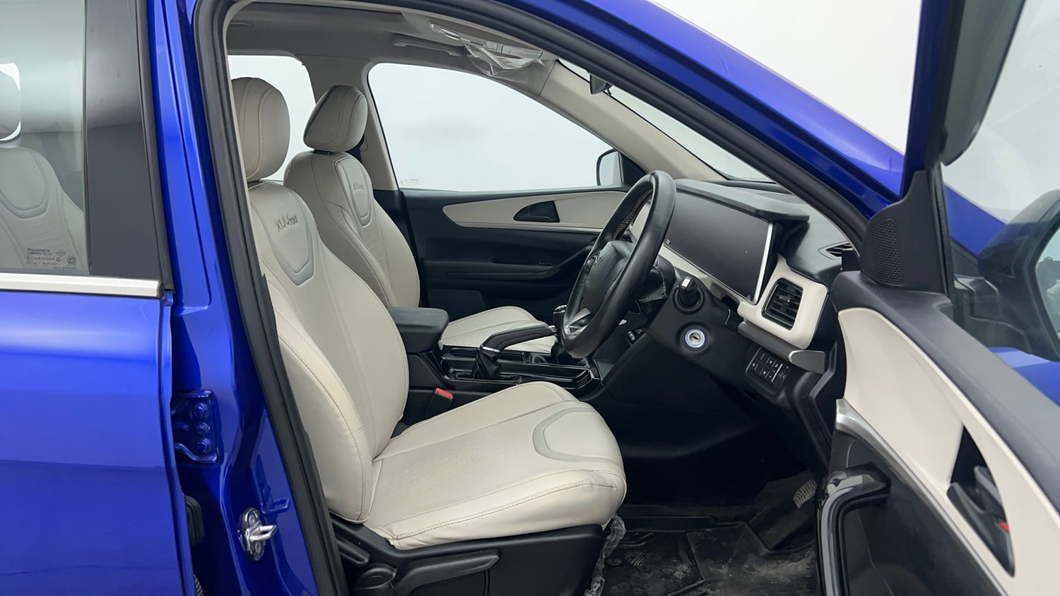 Used 2022 Mahindra XUV700 AX 5 Petrol MT 7 STR Petrol Manual interior RIGHT SIDE FRONT DOOR CABIN VIEW