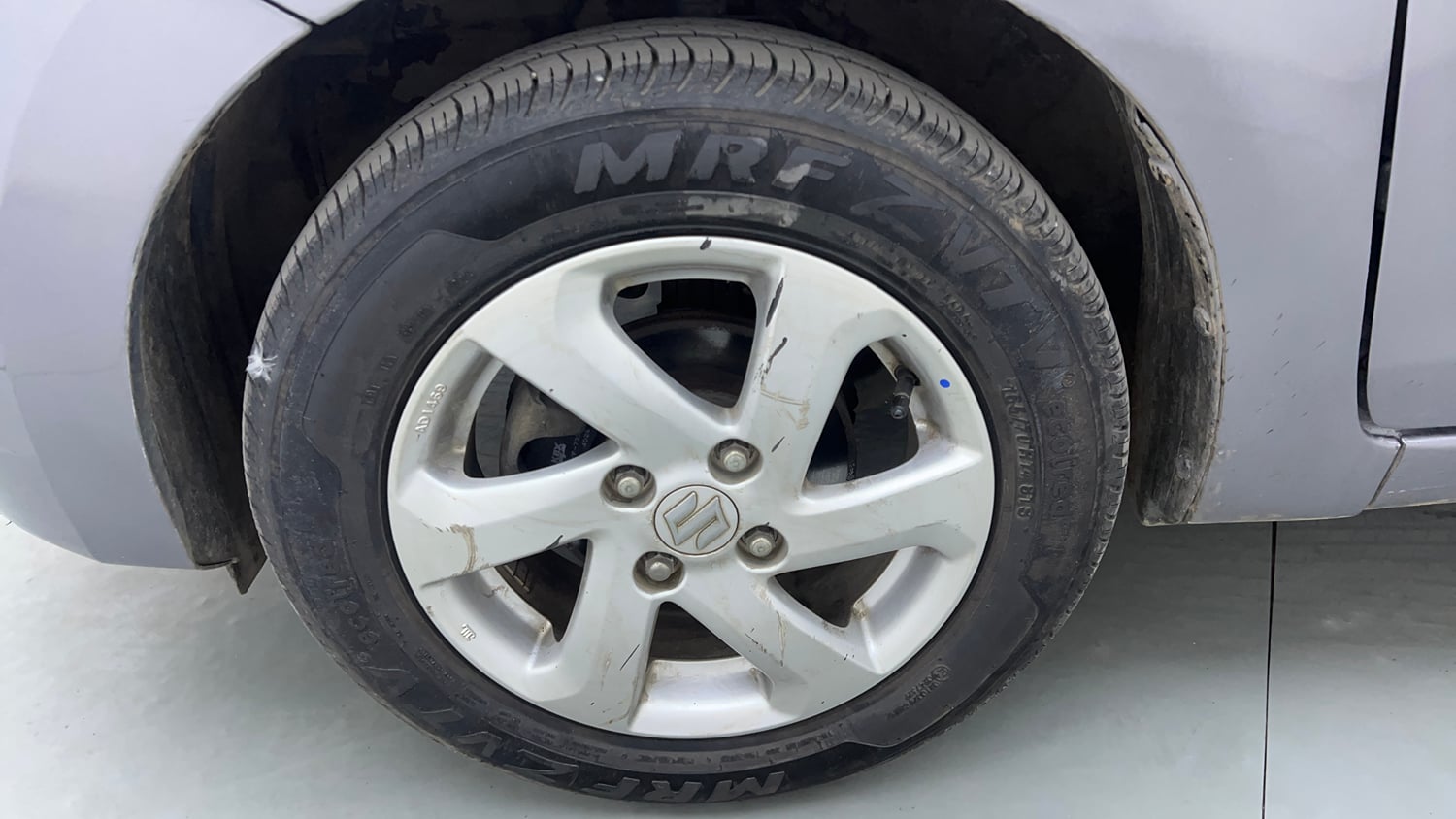 Used 2015 Maruti Suzuki Celerio ZXi Opt Petrol Manual tyres LEFT FRONT TYRE RIM VIEW