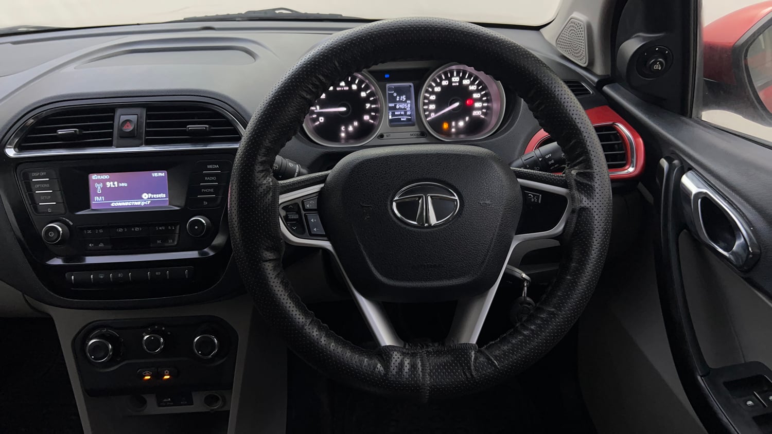 Used 2016 Tata Tiago Revotron XZ w/o Alloy Petrol Manual interior STEERING VIEW