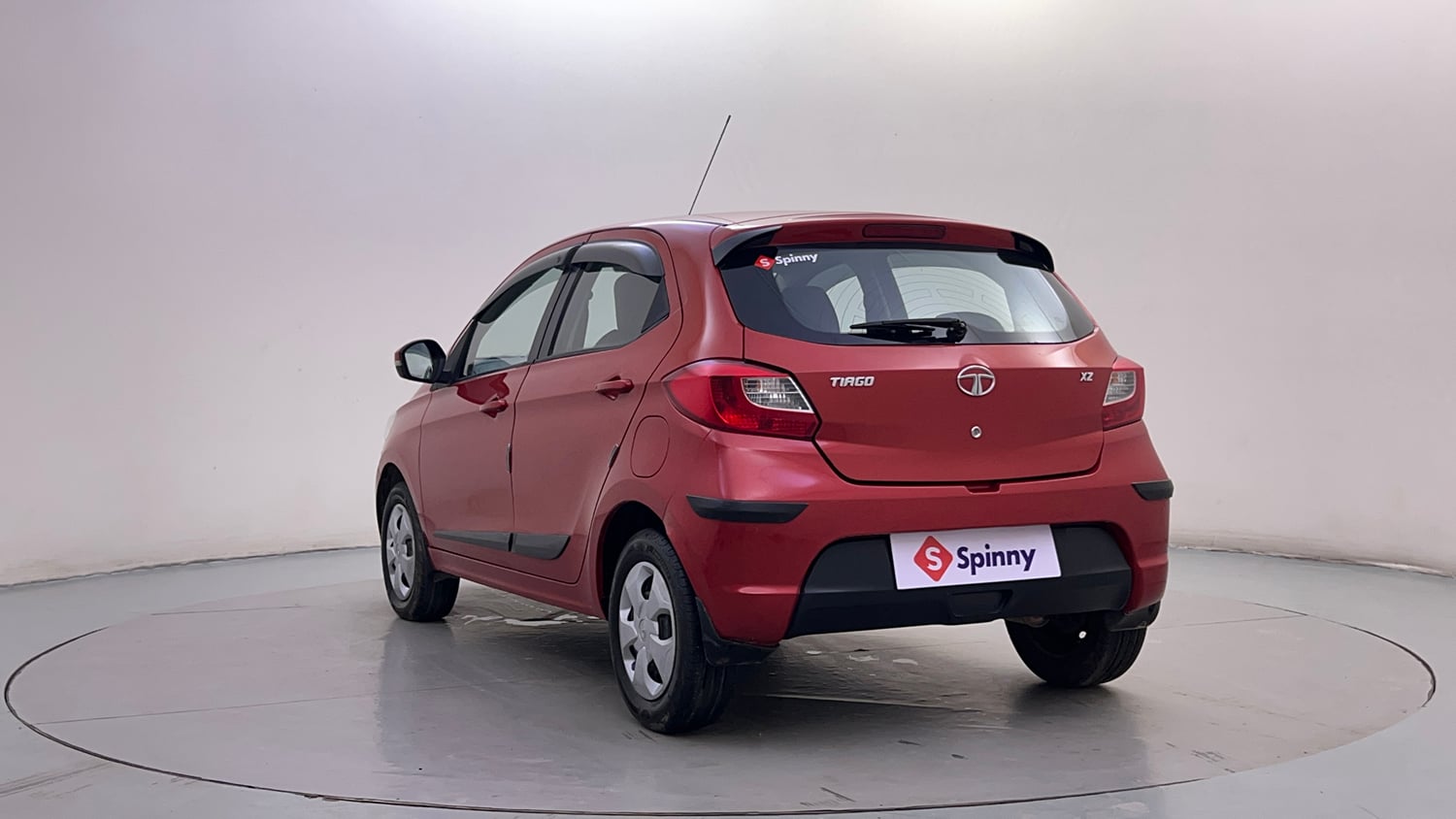 Used 2016 Tata Tiago Revotron XZ w/o Alloy Petrol Manual exterior LEFT REAR CORNER VIEW