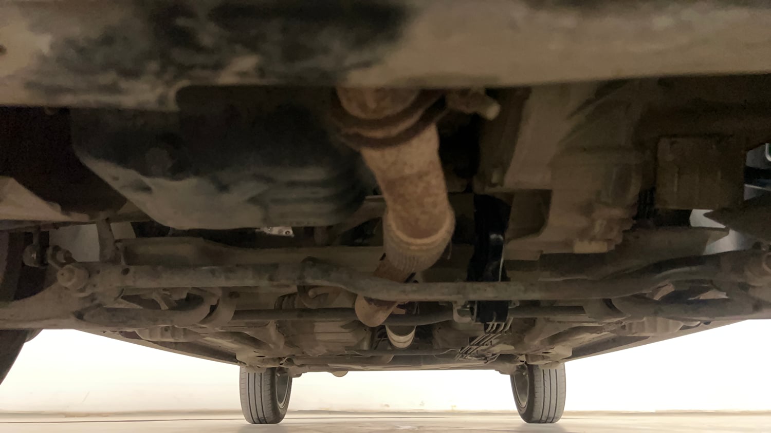 Used 2019 Tata Tigor Revotron XZA Petrol Automatic extra FRONT LEFT UNDERBODY VIEW