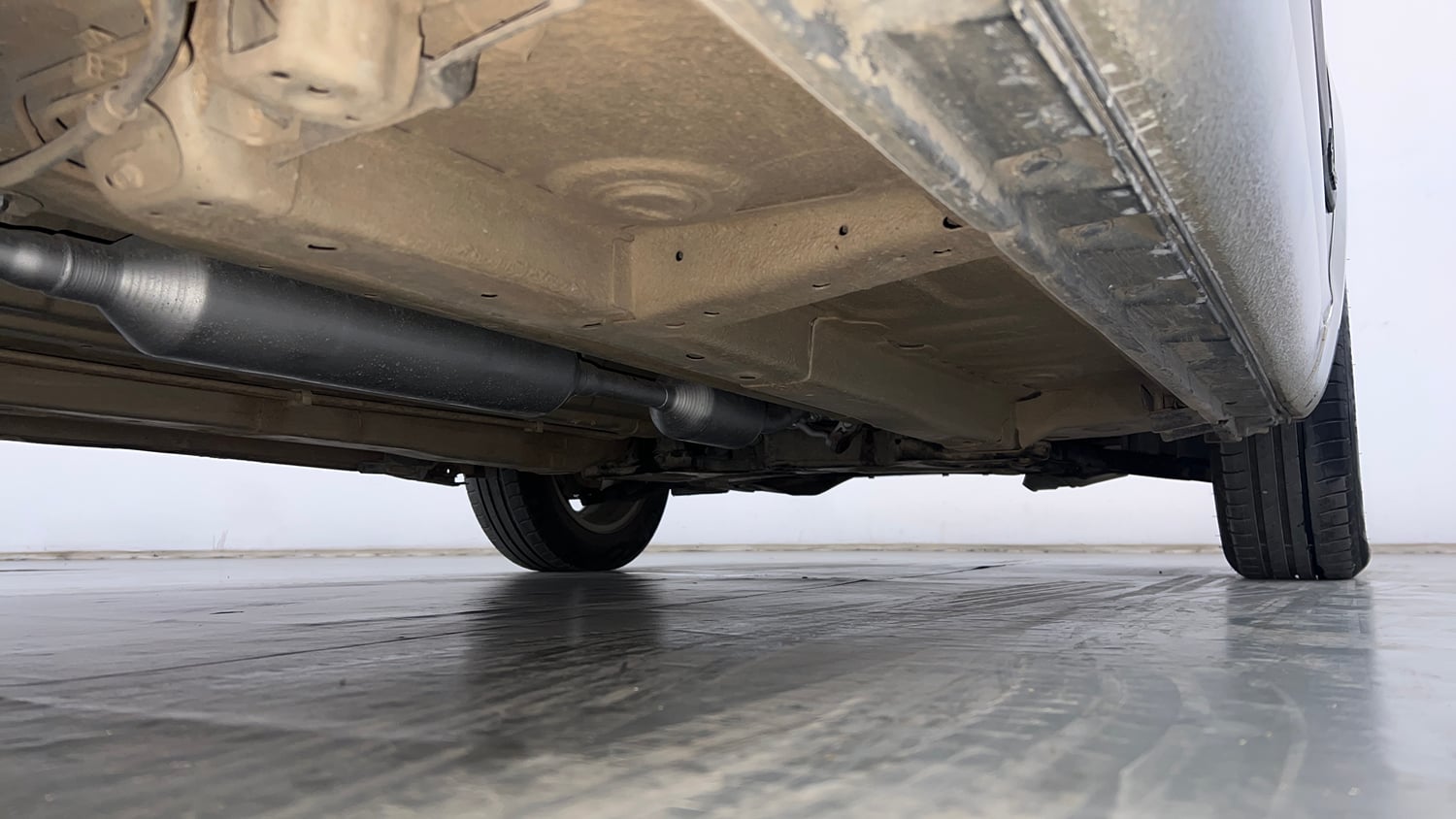 Used 2015 Maruti Suzuki Swift Dzire ZXI Petrol Manual extra REAR RIGHT UNDERBODY VIEW