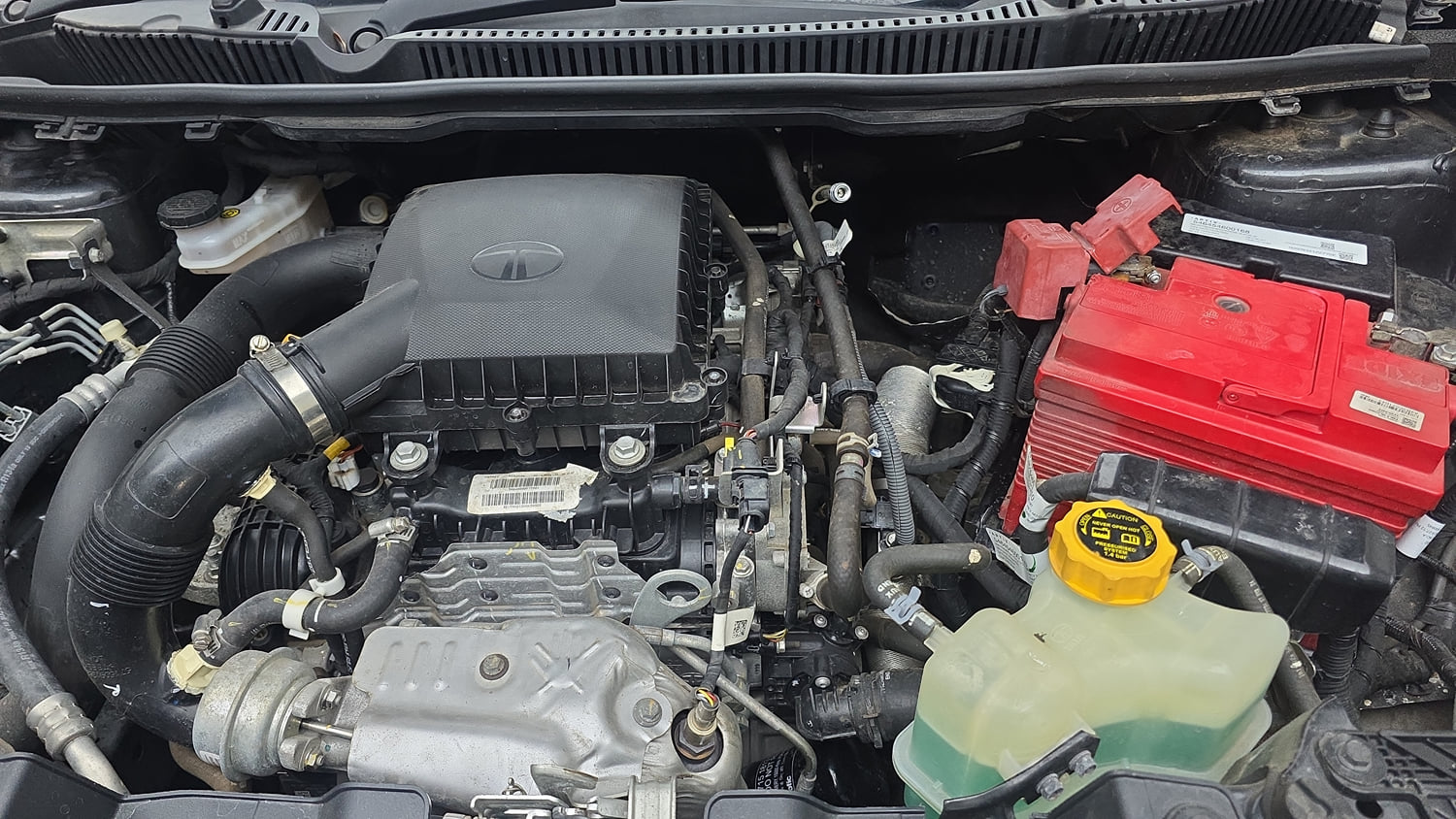 Used 2024 Tata Nexon Creative Plus 1.2 Revotron Petrol 6MT Petrol Manual engine ENGINE LEFT SIDE VIEW