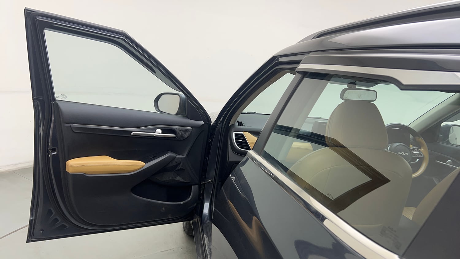 Used 2023 Kia Seltos HTK 1.5 Petrol Manual interior LEFT FRONT DOOR OPEN VIEW