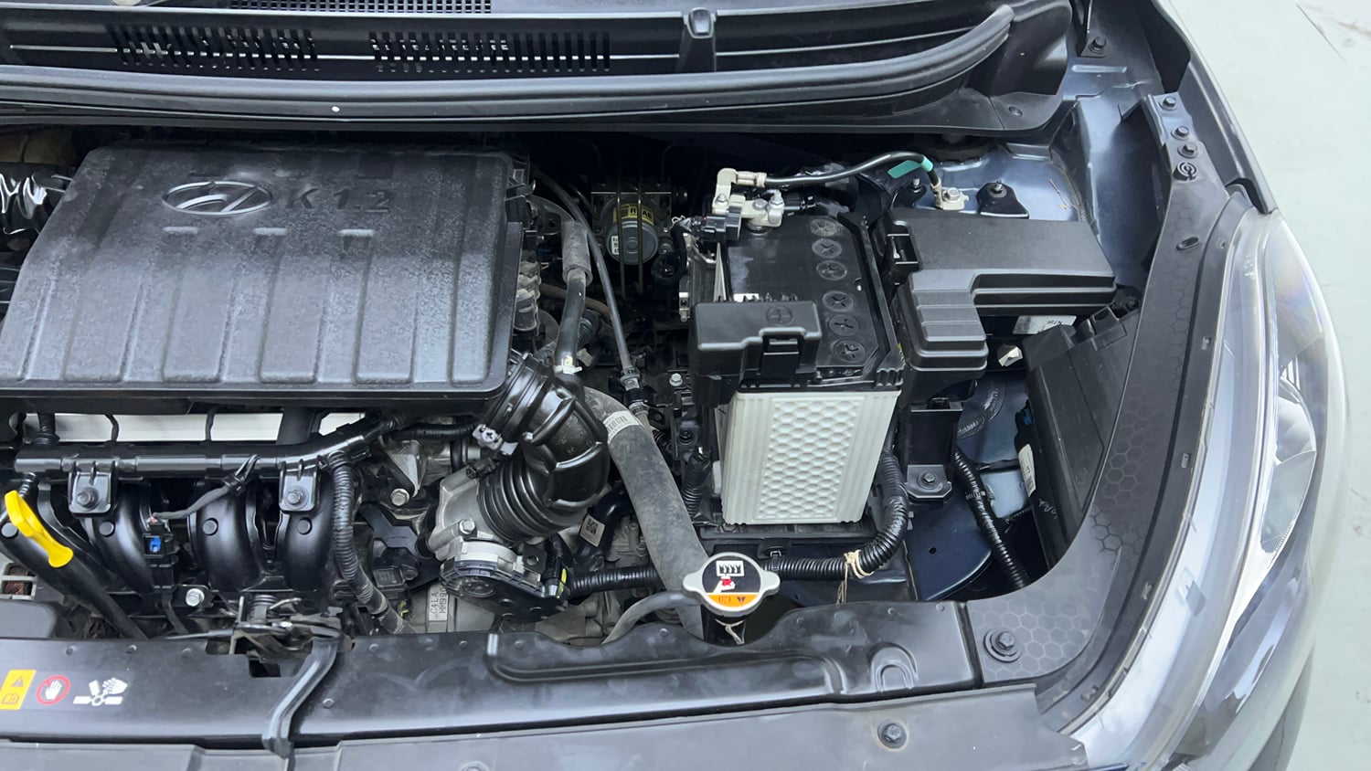 Used 2022 Hyundai Grand i10 Nios Sportz 1.2 Kappa VTVT Petrol Manual engine ENGINE LEFT SIDE VIEW