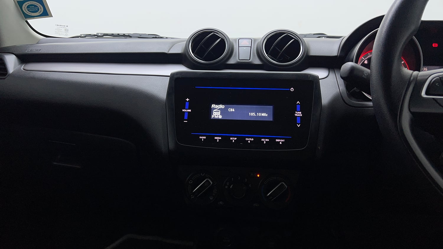 Used 2022 Maruti Suzuki Swift VXi Petrol Manual top_features Integrated (in-dash) music system
